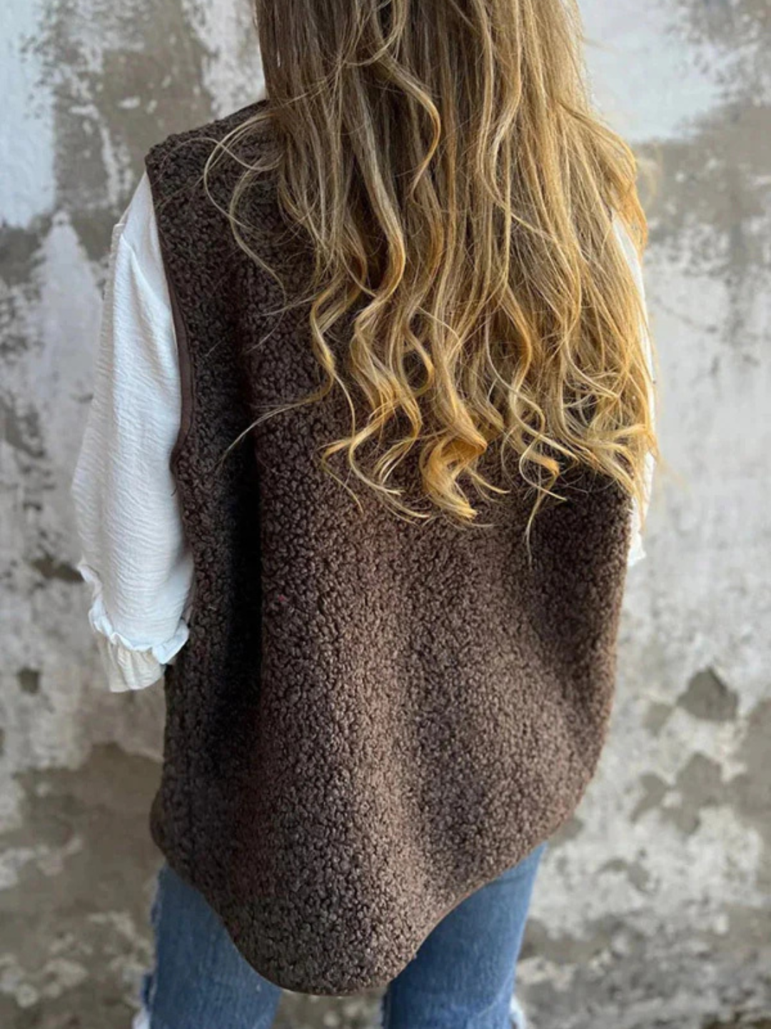 Nola | Mouwloos fleece vest met knoopsluiting