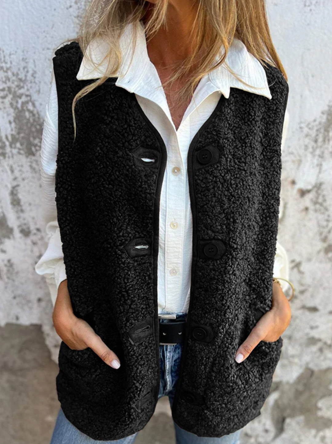 Nola | Mouwloos fleece vest met knoopsluiting
